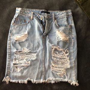 SOLD Ripped distressed denim skirt